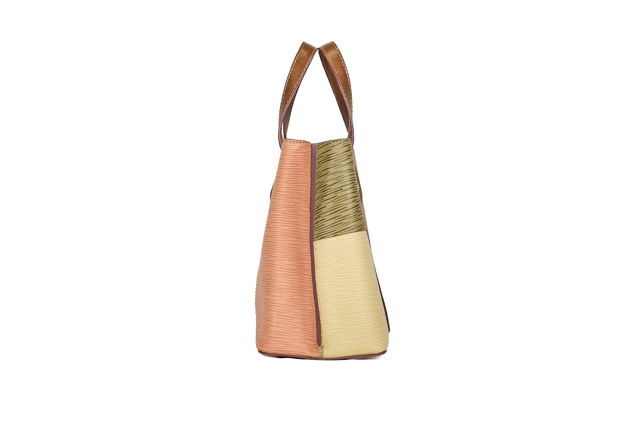 Vista lateral del bolso LE PETIT COLORÉ en cuero mix de colores, mostrando el perfil del shopper y sus asas.