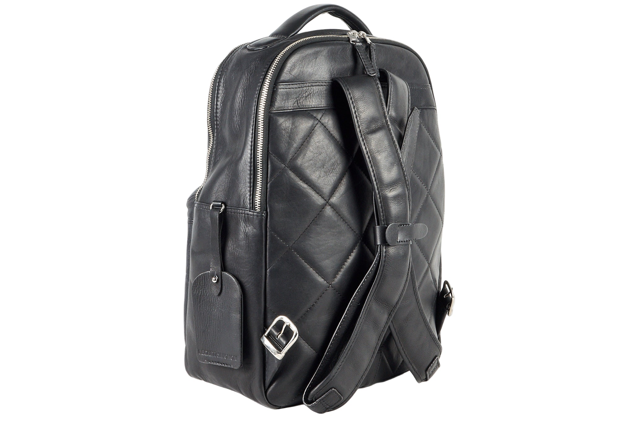 Morral de cuero negro ROCKY visto desde arriba en ángulo, mostrando asas y organización.